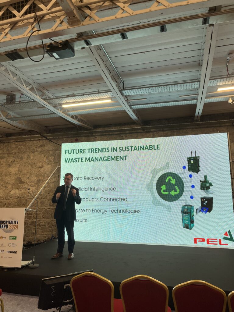 tommy griffith giving sustainability talk at hospitality expo 2024 sustainablity stage